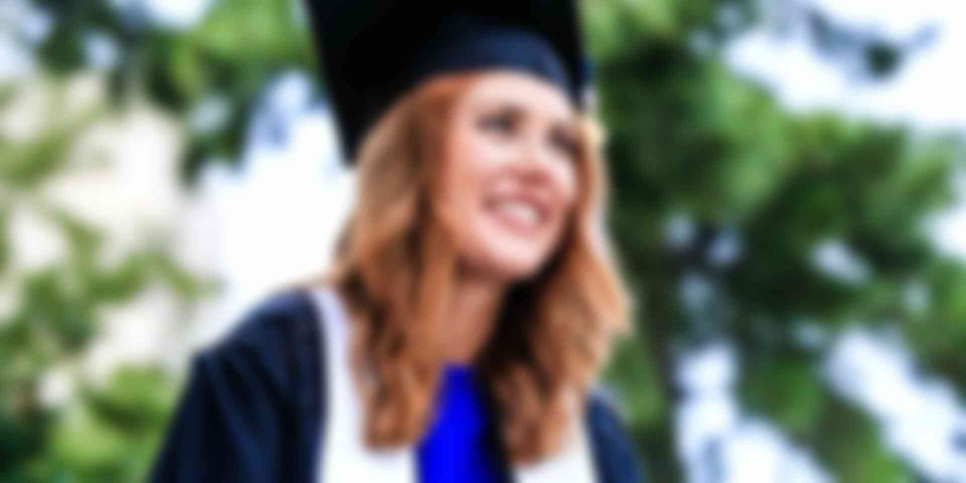 10 tips for new grads: how to succeed at your first job - woman-graduating-university
