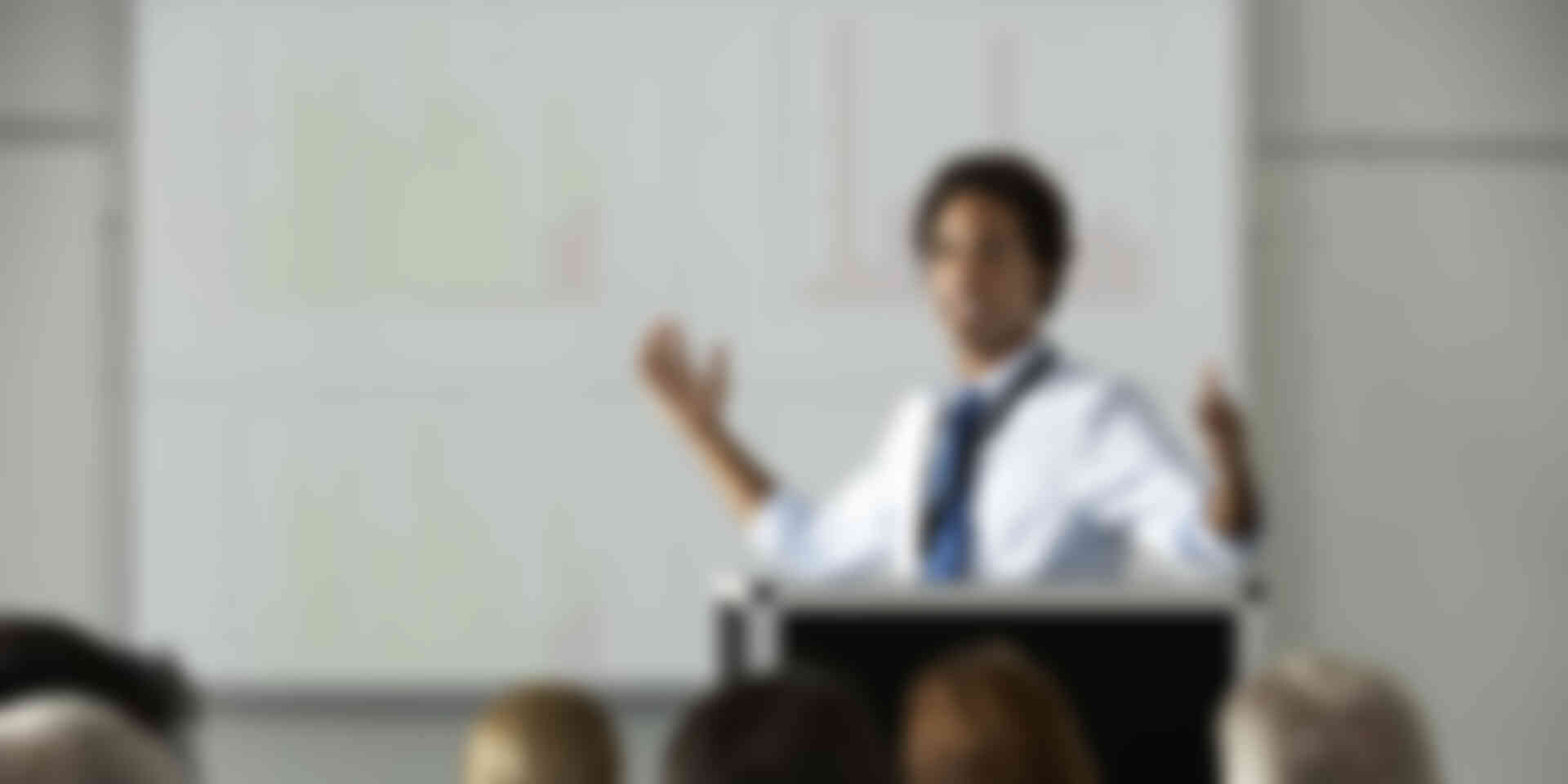 When concise PowerPoint slides aren’t enough - man-talking-during-business-presentation