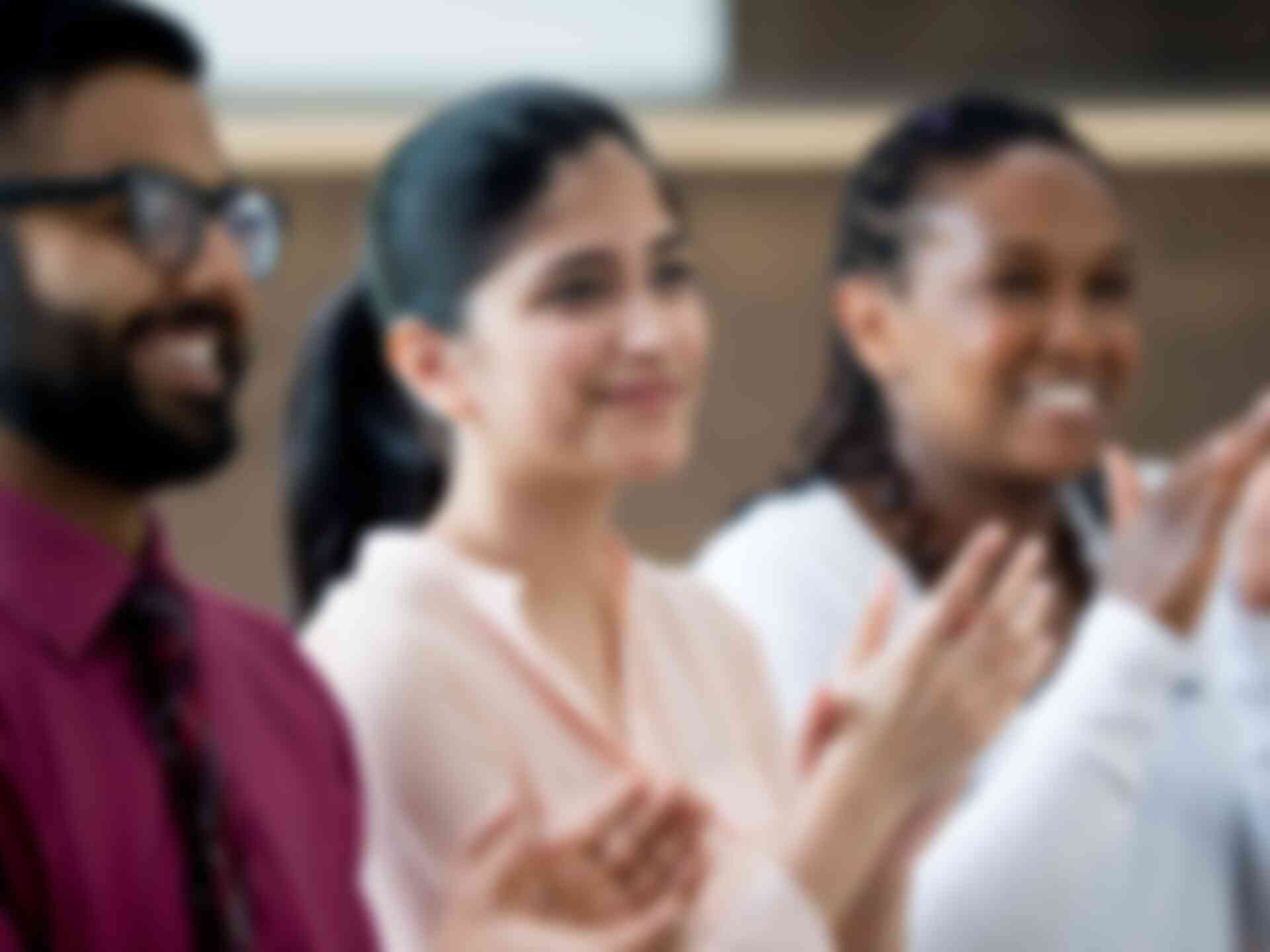 Home - group-applauding-presenter