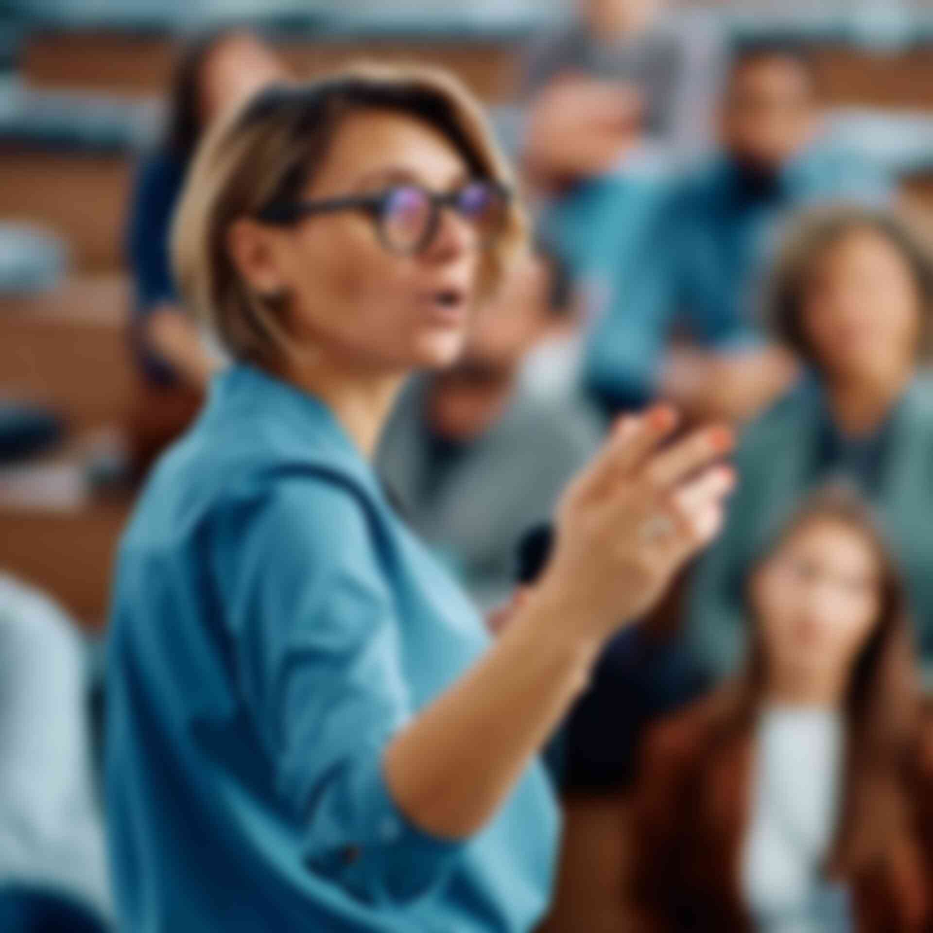 Home - woman-gesturing-at-presentation